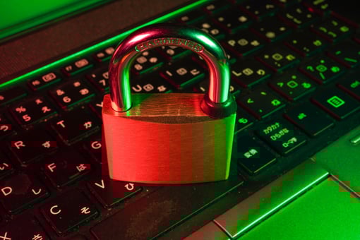 ATSI Houston Cyber Security Fails Lock Above Keyboard Glowing in Red and Green